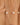Pearl bracelet on a wrist with a neutral background