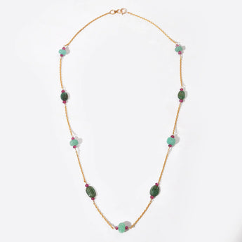 Necklace with green and pink beads on a white background