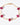 Gold bracelet with red beads on a white background